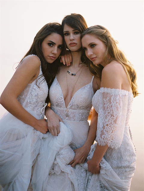 Photo of the models wearing bridal gowns